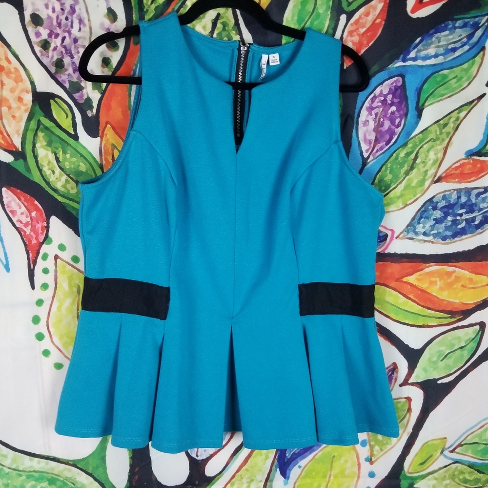 Elle Peplum Sleeveless Blouse